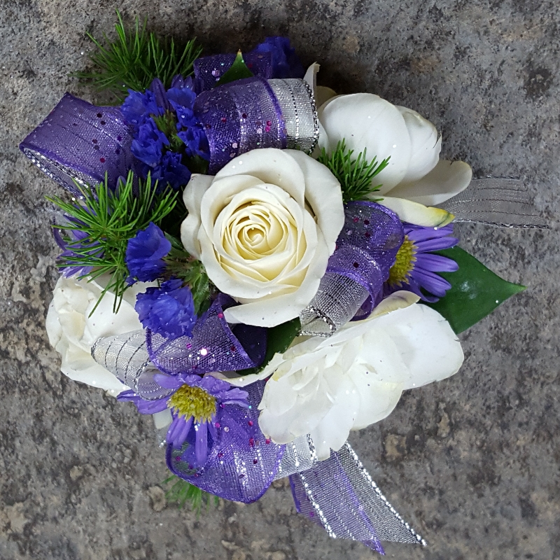 purple and white corsage